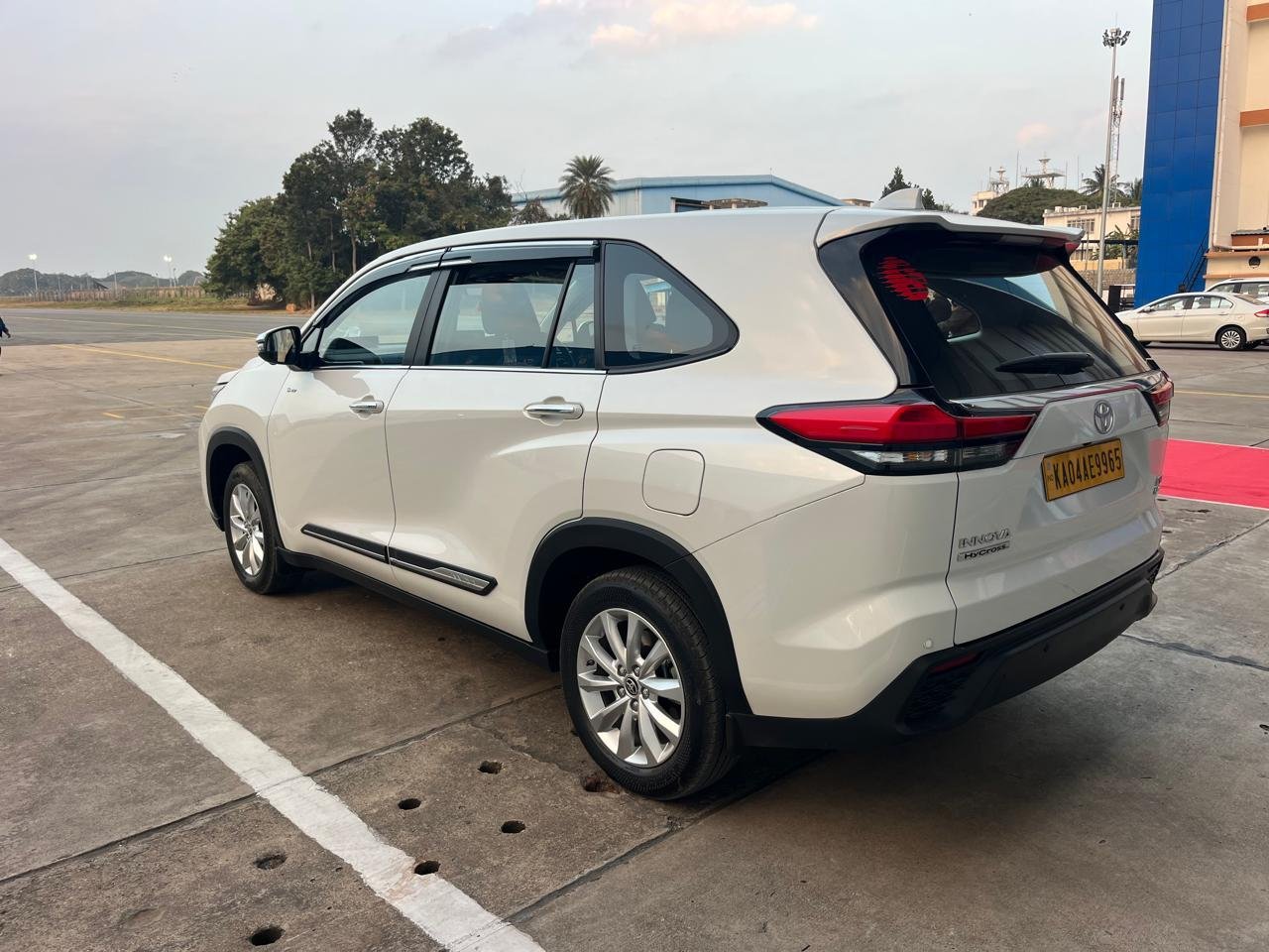Toyota Innova Hycross at airport drop taxi Bangalore